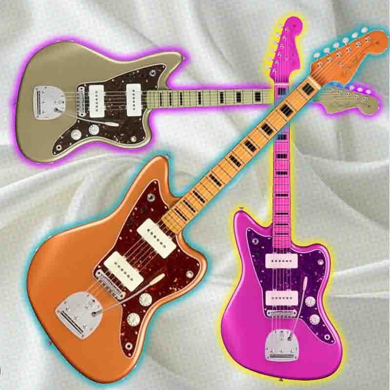 Three electric Fender Jazzmaster guitars on white silk background.